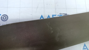Left tailgate trim for a 1918 Lincoln MKX, brown, scratches, broken fasteners