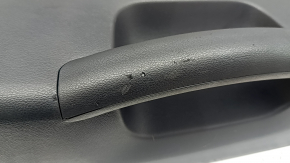 Black lower tailgate trim for a Hyundai Tucson 2022-2025, with handle, scratches