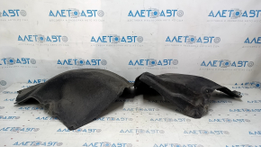 The rear right fender liner of a Honda Accord 23-24 is torn.