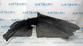 The rear right fender liner of a Honda Accord 23-24 is torn.