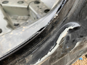 Front right quarter panel of an Audi E-Tron 19-23, black LY9T, on the body, the pillar at the bottom is dented
