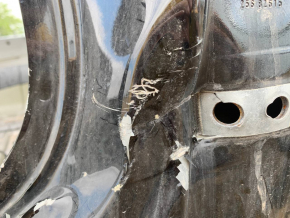 Front right quarter panel of an Audi E-Tron 19-23, black LY9T, on the body, the pillar at the bottom is dented