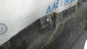 The left underbody protection of the BMW X3 G01 18-21 is dented and torn.