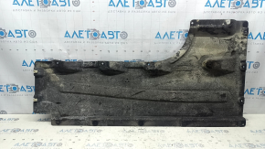 The left underbody protection of the BMW X3 G01 18-21 is dented and torn.