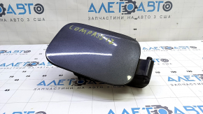 Jeep Compass 17-24 fuel filler door assembly with housing, no motor in the door.