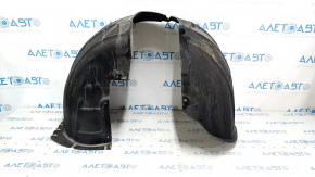 The front right fender liner of a Chevrolet Equinox 18-24 is torn.