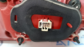 The right inner tailgate light for a Kia Niro 17-22 halogen is worn and the seal is peeling off.