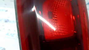 The right inner tailgate light for a Kia Niro 17-22 halogen is worn and the seal is peeling off.
