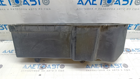 The air suspension compressor cover of the Audi E-Tron 19-23 has a broken housing fragment.