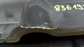 The air suspension compressor cover of the Audi E-Tron 19-23 has a broken housing fragment.