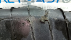 The lower control arm cover under the rear right spring of the Audi E-Tron 19-23 is worn out.