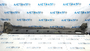 The left underbody protection of the Audi E-Tron 19-23 is torn and cracked.