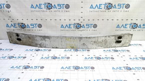 The rear bumper reinforcement for a Toyota Camry v50 12-14 USA is dented.
