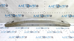 The rear bumper reinforcement for a Toyota Camry v50 12-14 USA is dented.