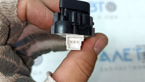 The front left central locking button for a Mercedes C-class W205 15-18 is black and has peeled off.