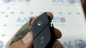 The front left central locking button for a Mercedes C-class W205 15-18 is black and has peeled off.
