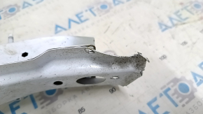 The right headlight lens of the Chevrolet Equinox 22-24 is dented and torn.