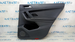 Black rear right door panel for a VW Tiguan 18-20, black leather armrest, plastic insert, with handle, scratches