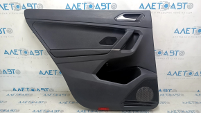 Rear left door panel for a VW Tiguan 18-20, black leather armrest, plastic insert, with handle, scratches