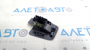 The trunk release button cover for the VW Tiguan 18-24 interior is broken.