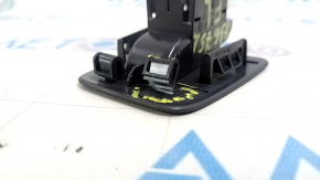 The trunk release button cover for the VW Tiguan 18-24 interior is broken.