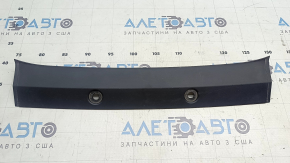 The front center hood trim for the Polestar 2 21-25 is worn.