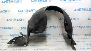 The front right fender liner of a Honda Accord 23-24 is torn.