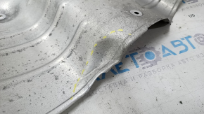 The rear muffler heat shield of a Honda Accord 23-24 is dented.