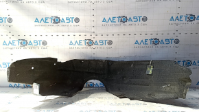 The rear right fender liner of a Toyota Avalon 13-18 has torn fasteners.