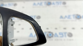 The steering wheel cover of a Mercedes C-class W205 15-18 has peeling coating and scratches.