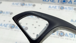 The steering wheel cover of a Mercedes C-class W205 15-18 has peeling coating and scratches.