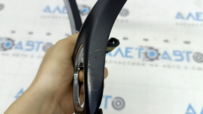 The steering wheel cover of a Mercedes C-class W205 15-18 has peeling coating and scratches.