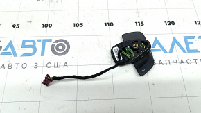 The left steering wheel paddle shifter on a Mercedes C-class W205 15-18 has peeled off.