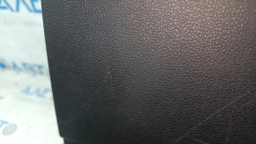 VW Tiguan 18-24 black glove compartment, with scratches and a CD changer.