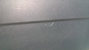 VW Tiguan 18-24 black glove compartment, with scratches and a CD changer.