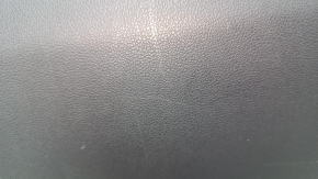 VW Tiguan 18-24 black glove compartment, with scratches and a CD changer.