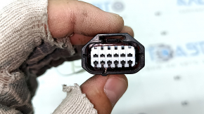 A wiring harness for the front bumper of a 19-25 Toyota Rav4, without parking sensors or fog lights.