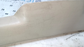 Upper trunk door trim for a Lexus RX300 98-03, beige, with brake light, scratches, nicks, scuffs, needs cleaning