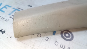 Upper trunk door trim for a Lexus RX300 98-03, beige, with brake light, scratches, nicks, scuffs, needs cleaning