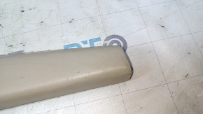 Upper trunk door trim for a Lexus RX300 98-03, beige, with brake light, scratches, nicks, scuffs, needs cleaning