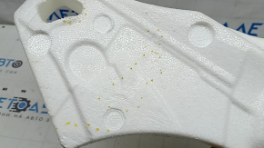 The foam under the spare tire of a Toyota Rav4 19-25 is crushed.
