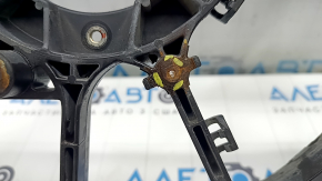 The diffuser radiator shroud is bare for a Toyota Camry V50 12-14 hybrid USA. The embedded parts are drilled out and the bolts are broken off.