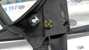 The diffuser radiator shroud is bare for a Toyota Camry V50 12-14 hybrid USA. The embedded parts are drilled out and the bolts are broken off.