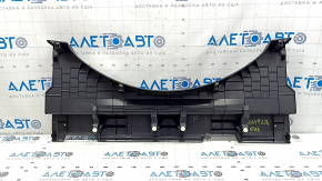 The trunk floor lining for a Toyota Rav4 19-25 is black and worn.
