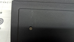 The trunk floor lining for a Toyota Rav4 19-25 is black and worn.