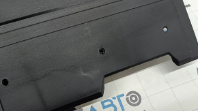The trunk floor lining for a Toyota Rav4 19-25 is black and worn.