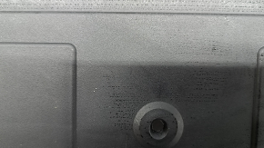 The trunk floor lining for a Toyota Rav4 19-25 is black and worn.