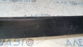 Upper front trunk trim behind the seats for a 2003-2008 Nissan 350z, black, scratches
