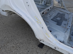 The rear right fender of a Chevrolet Equinox 18-24 is sunken on the body, white, dented
