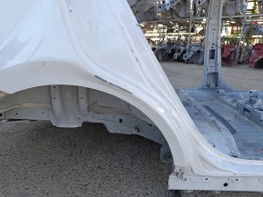The rear right fender of a Chevrolet Equinox 18-24 is sunken on the body, white, dented